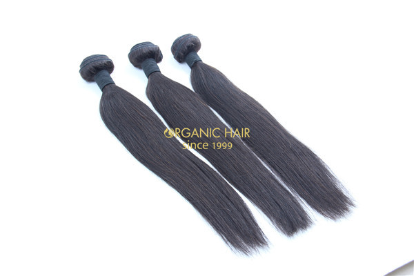 Human hair weft extensions